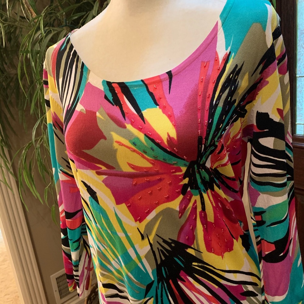 Great, fun, resort shirt - dress up or down.